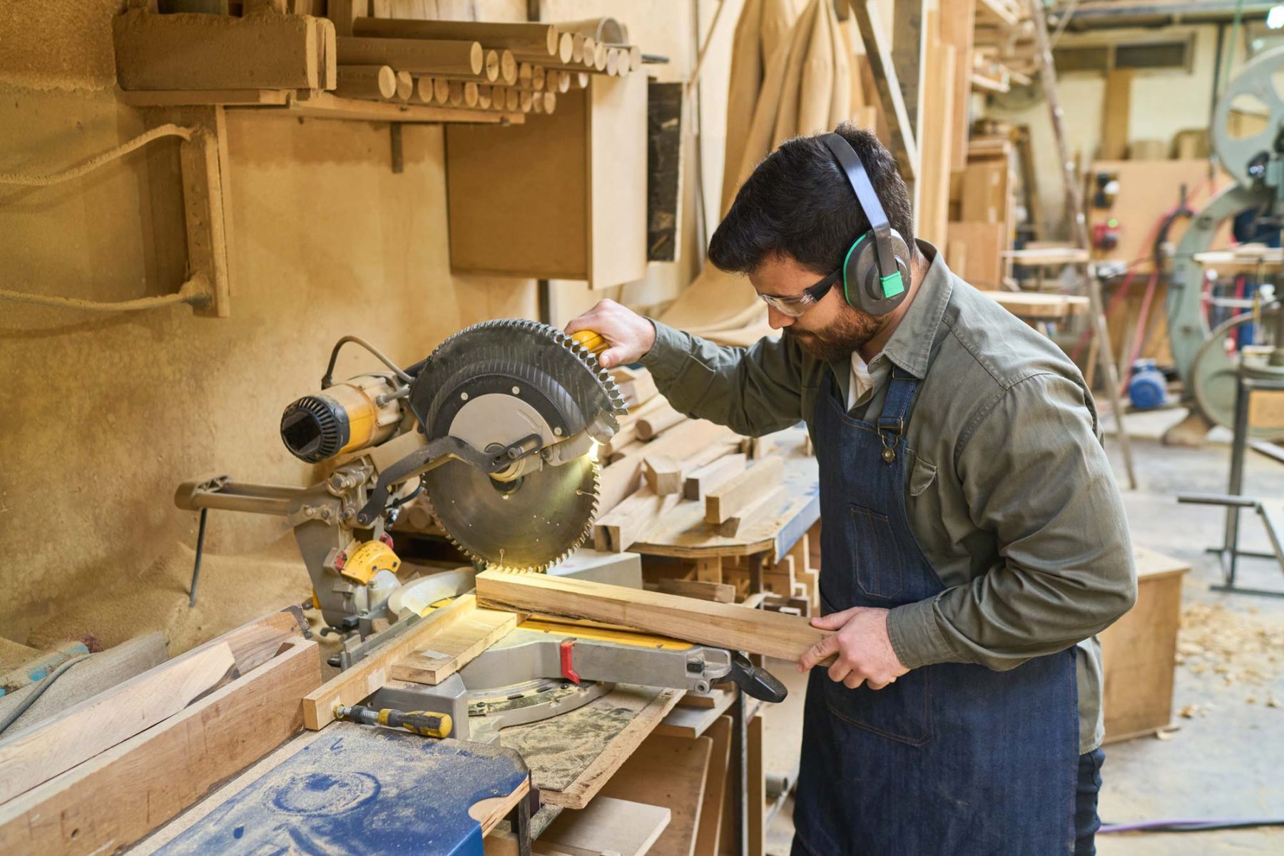 man working in wood shop of lumberyard