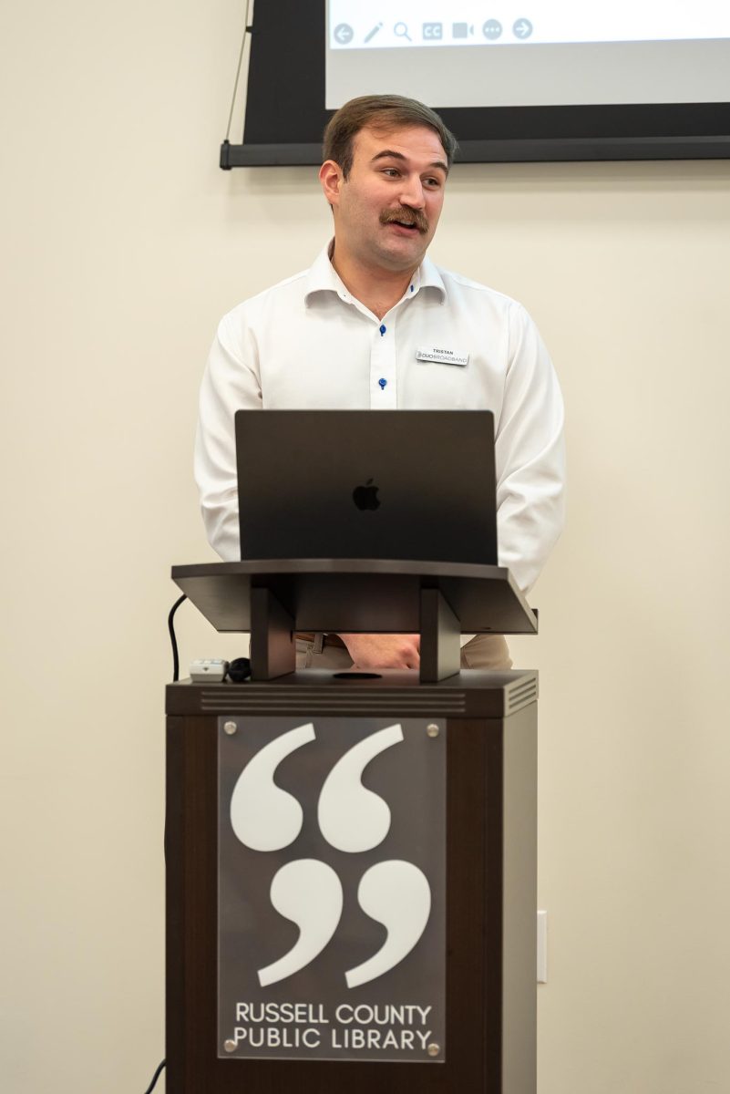 Man talking at a podium