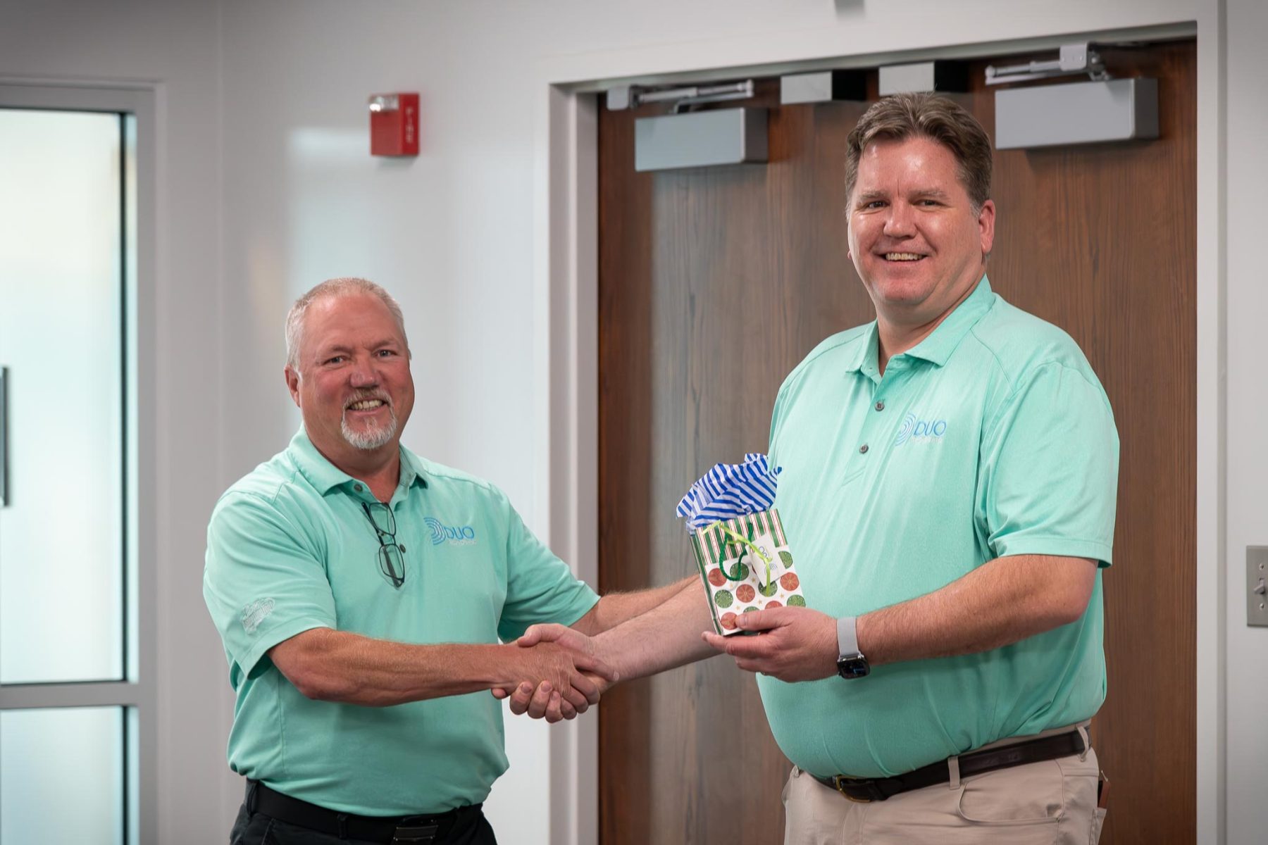 Eric West and Tom Preston with retirement gift