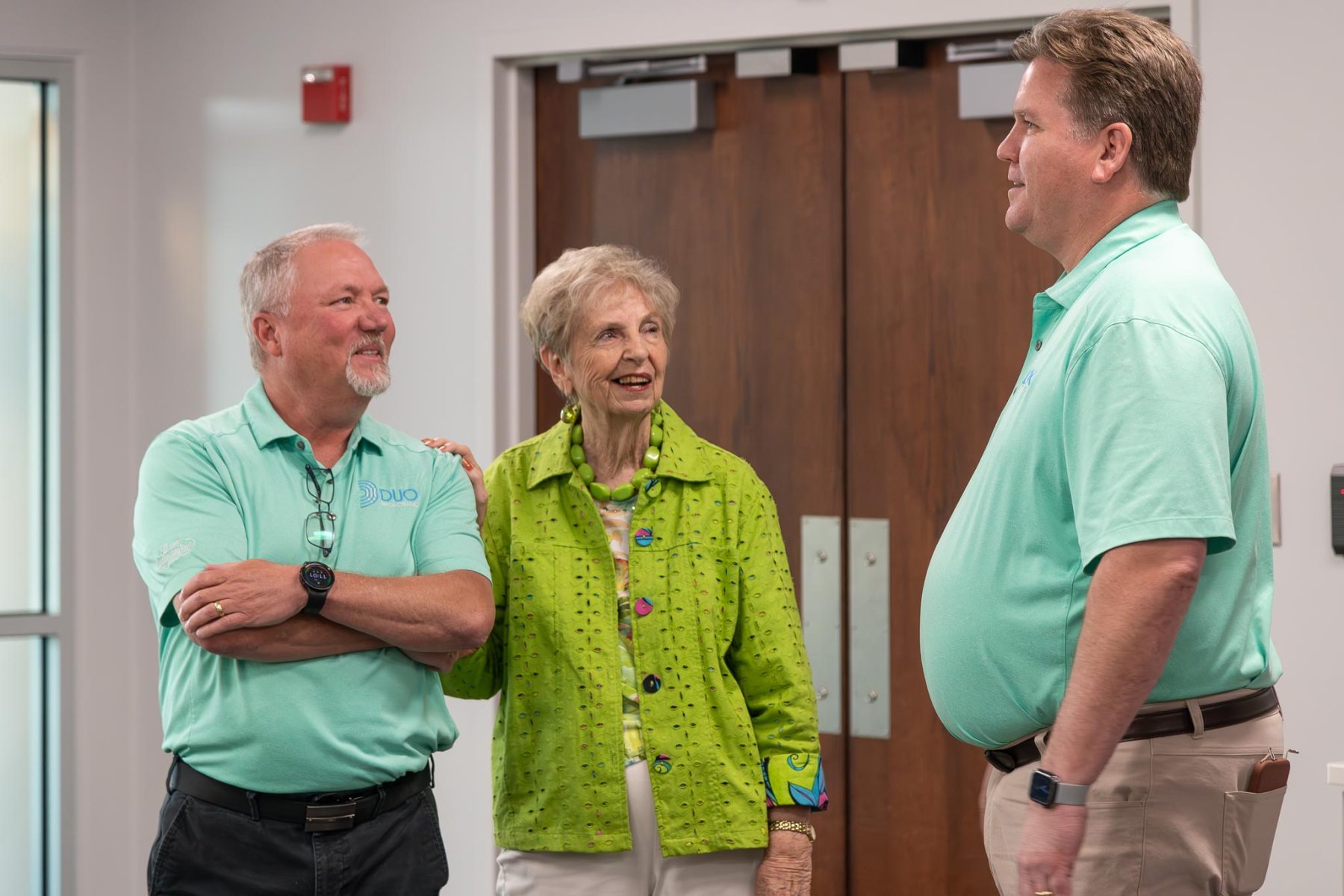 Eric West talking with well wishers